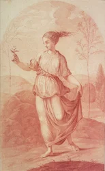 Eine junge Frau geht barfuß in einer Landschaft